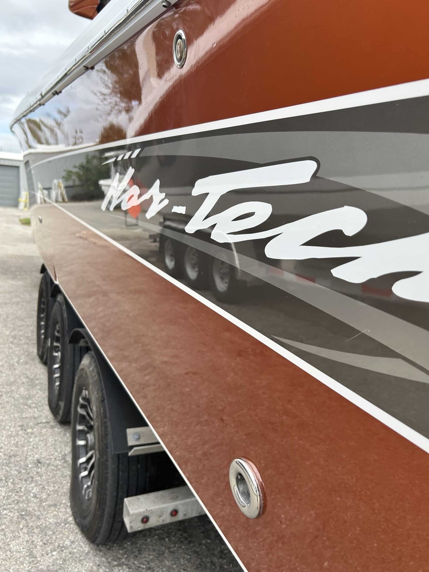 Boat hull on a triple-axle trailer