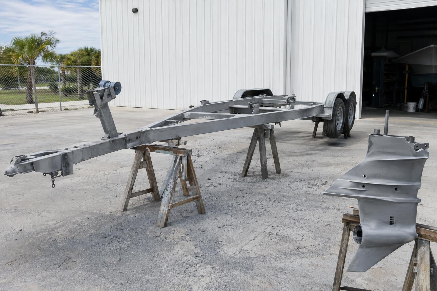 Illustration: trailer and outboard lower unit blasted to bare metal